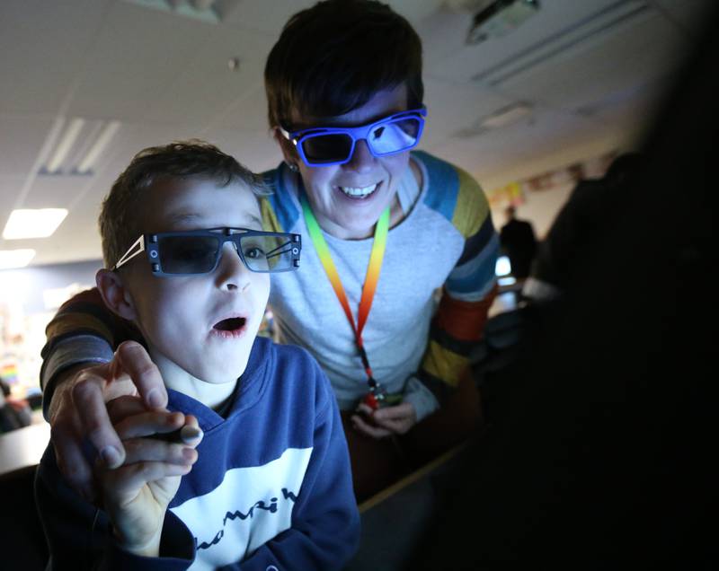 Declan Hawkins and Mrs. Nicole Heaver STEM teacher explores the Central Z-Space Lab during STEM Family Night on Tuesday, March 7, 2023 at Central and Shepherd School in Ottawa.