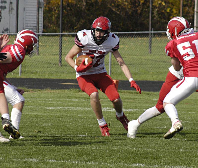 Fulton's Baylen Damhoff cuts upfield against Morrison, Saturday, Oct. 28, 2023 in round one of the Class 1A football playoffs.