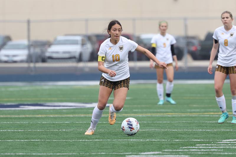 Joliet West’s Julia Martinez works the ball upfield against Plainfield South on Thursday, April 18, 2024.