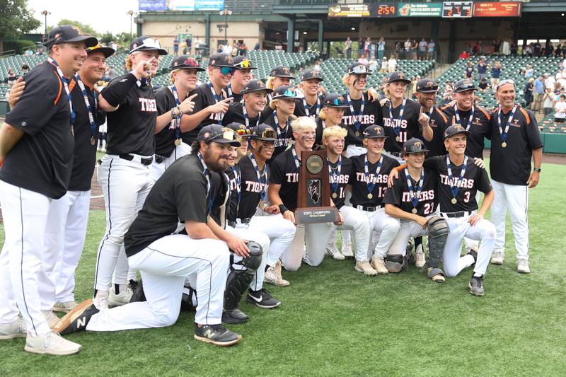 Crystal Lake Central poses for a photo with the championship trophy after their win against Lemont in the IHSA Class 3A Championship game on Saturday June 8, 2024 Duly Health and Care Field in Joliet.