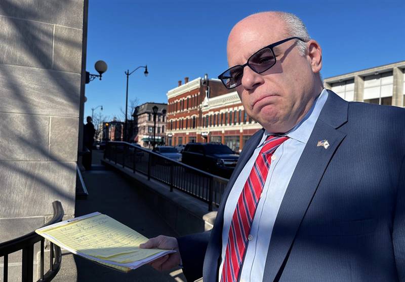 Former Republican state Sen. Sam McCann speaks to reporters outside the federal courthouse in Springfield on Monday, Nov. 27, 2023, after he was granted another delay in his corruption trial, which was set for this week. McCann was also granted a last-minute motion to ditch his federal public defender in order to represent himself.