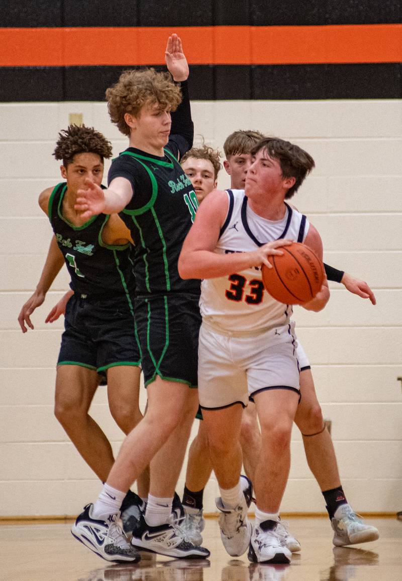 Rock Falls' Kuitim Heald defends against Byron's Caden Considine during the second quarter of the 2A Byron Regional championship game on Saturday, Feb. 25, 2023.