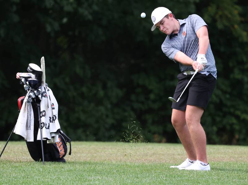 DeKalb’s Jonah Keck chips onto the fourth green Monday, Sept. 16, 2024, during the Mark Rolfing Cup at the Kishwaukee Country Club in DeKalb.