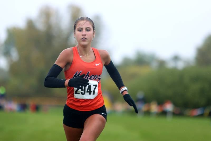 McHenry’s Danielle Jensen wins the Fox Valley Conference Girls Cross Country Meet at Plato Park in Elgin Saturday.