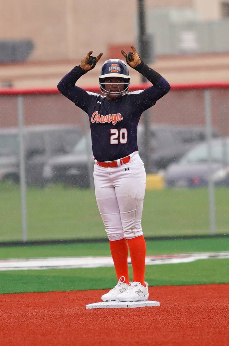 Oswego’s Jaelynn Anthony (20) reacts after hitting a double against Yorkville during a softball game at Yorkville High School on Thursday, May 9, 2024.