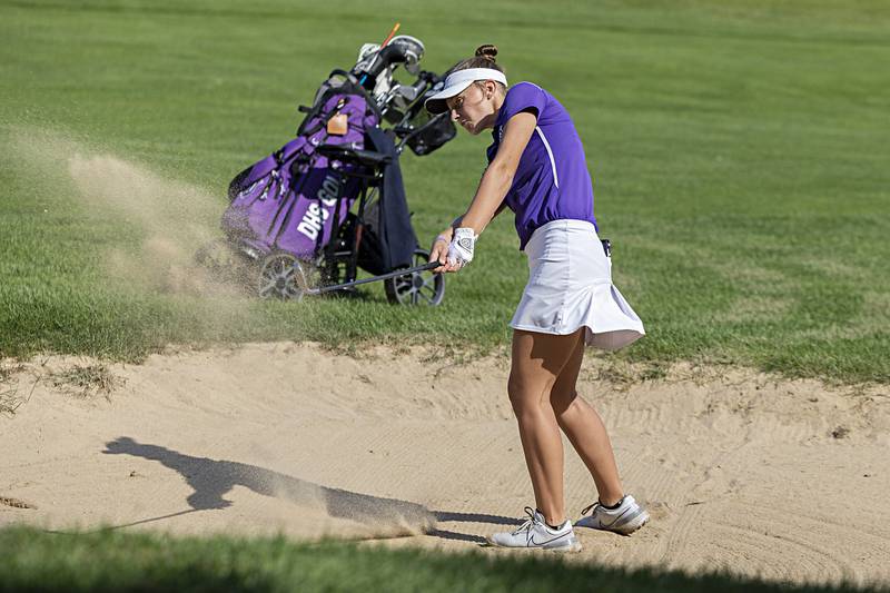 Dixon’s Katie Drew blasts out of the sand on the 3rd hole Monday, Oct. 2, 2023 at the Eastland girls golf sectional at Lake Carroll Golf Club.