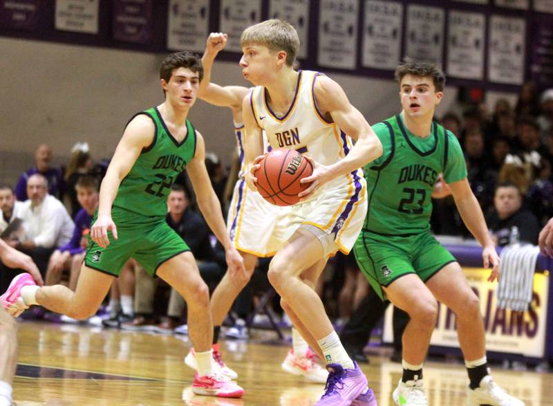 Downers Grove North’s Alex Miller dribbles the ball during a game against York at Downers Grove North on Friday, Jan. 19, 2024.