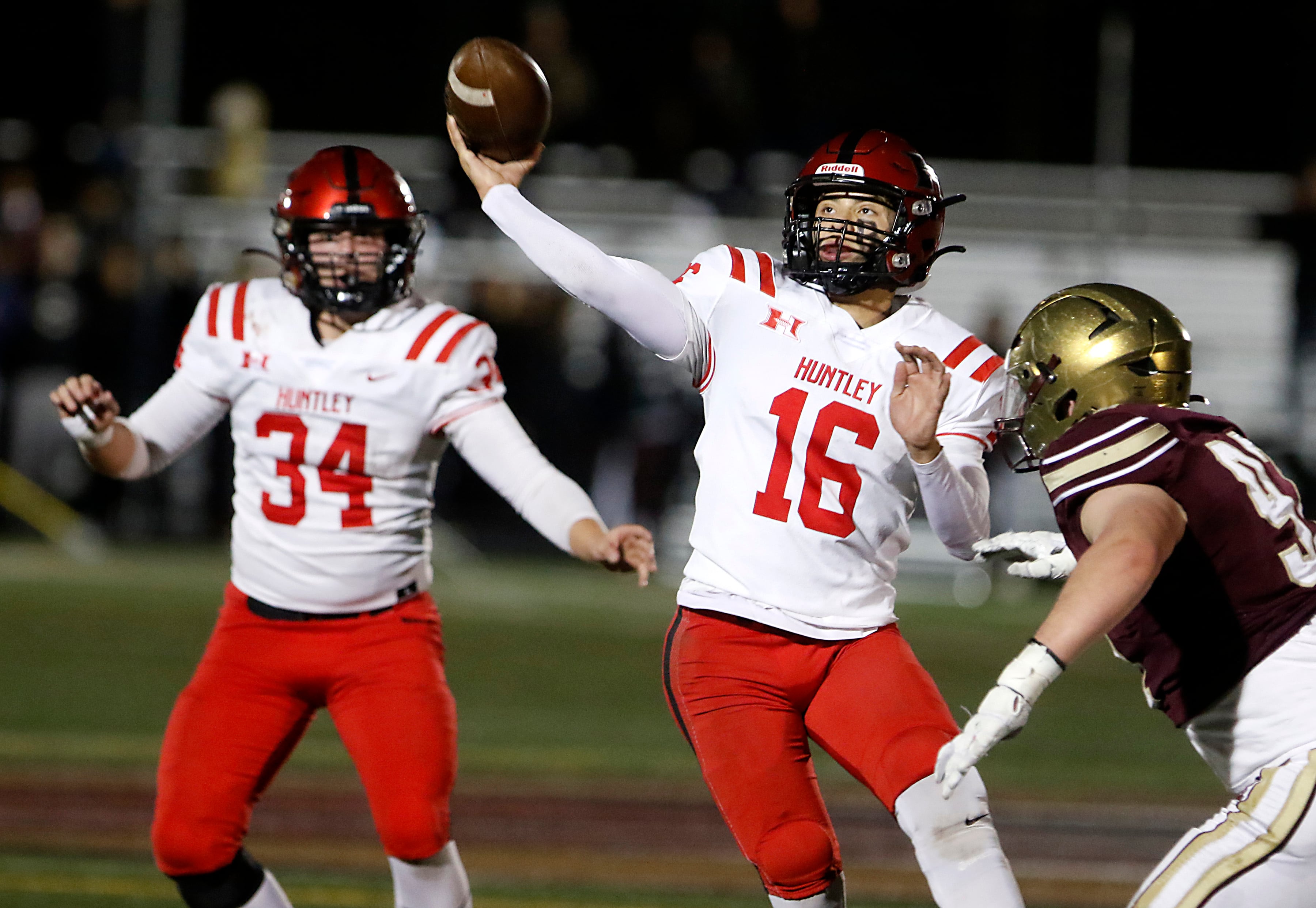 Huntley's Braylon Bower throws a pass as during a IHSA Class 8A second round playoff football game against St. Ignatius on Friday, Nov. 3, 2023, at St. Ignatius College Prep in Chicago.