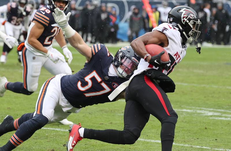 Chicago Bears linebacker Jack Sanborn tries to tackle Atlanta Falcons cornerback Dee Alford on a kickoff return during their game Sunday, Dec. 31, 2023, at Soldier Field in Chicago.