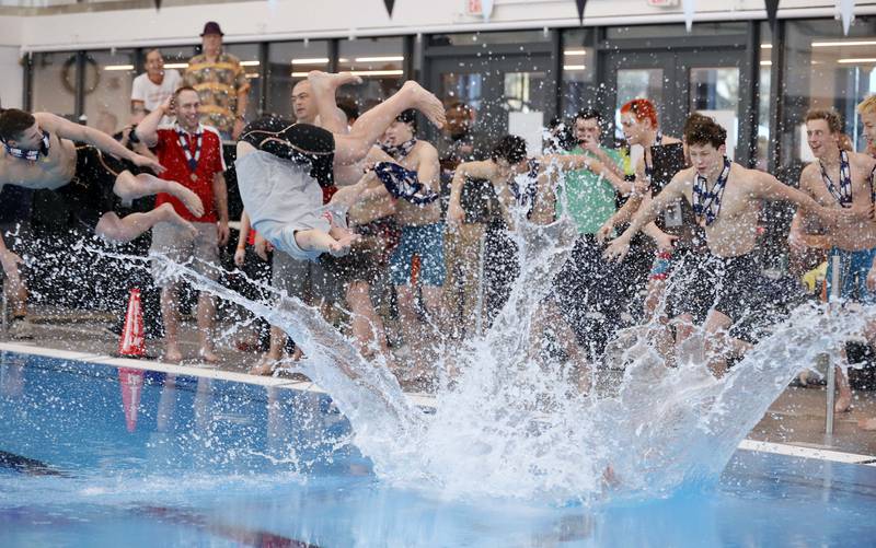 Hinsdale Central celebrates after winning the IHSA Boys state swim finals Saturday February 25, 2023 in Westmont.