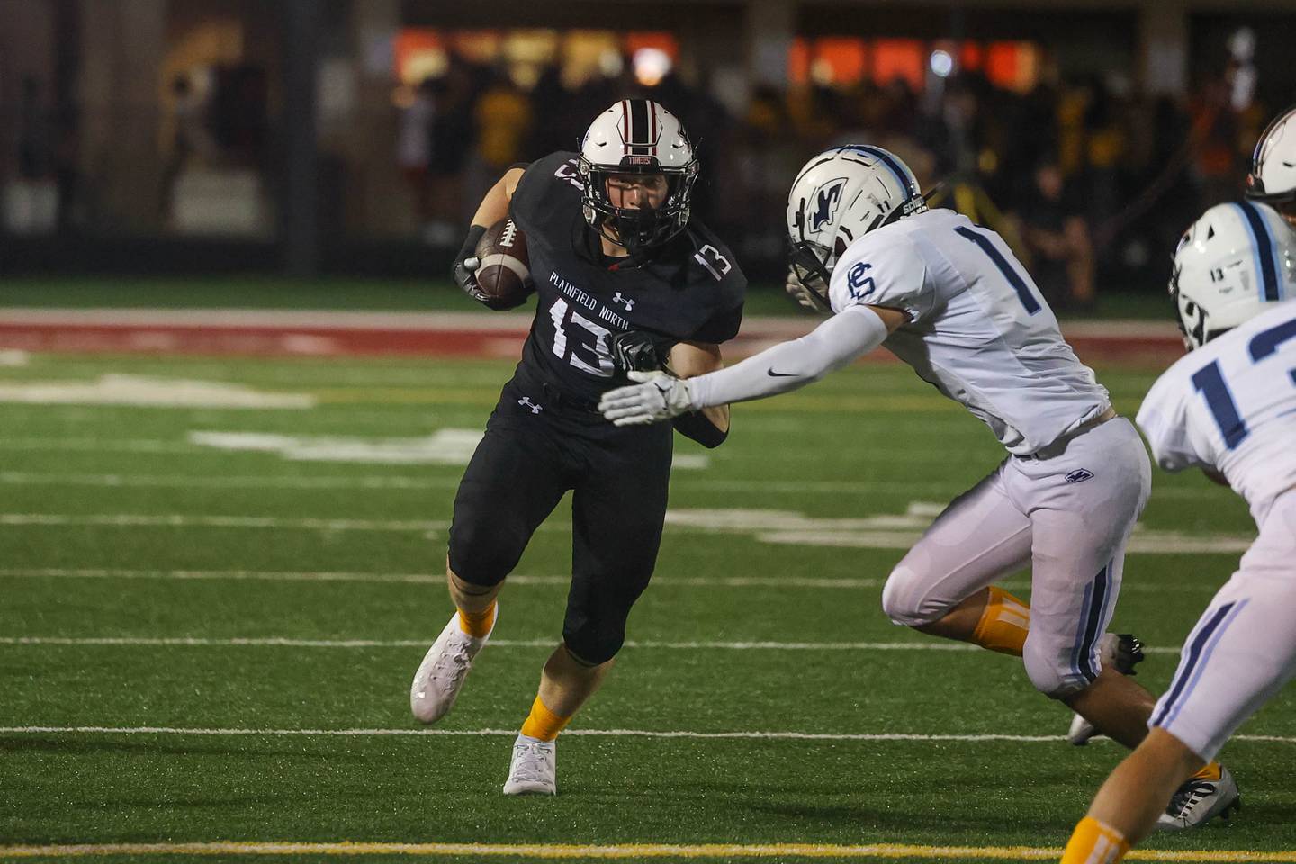 Plainfield North’s  Braxton Bartz heads upfield after a catch against Plainfield South. Thursday, Sept. 15, 2022, in Plainfield.