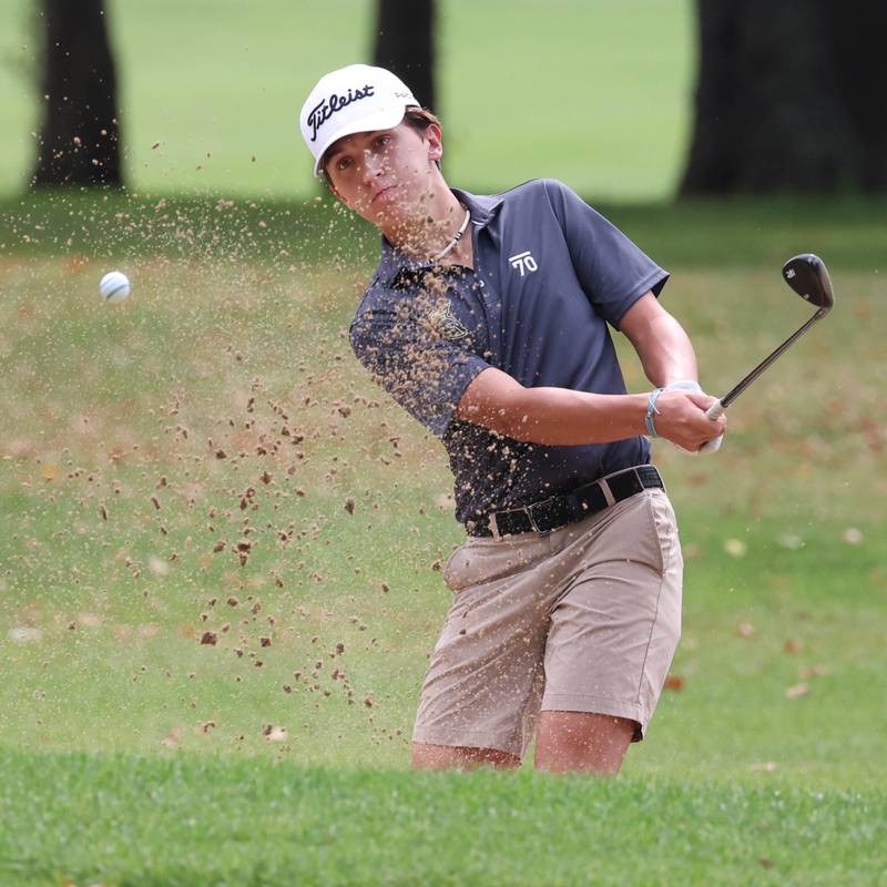 Sycamore’s Andrew Swedberg blasts out of the sand onto the green Monday, Sept. 16, 2024, during the Mark Rolfing Cup at the Kishwaukee Country Club in DeKalb.