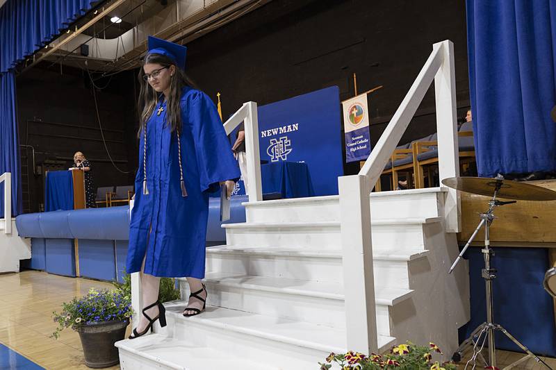 Leah Kalina leaves the stage after receiving her diploma Wednesday, May 15, 2024 at Newman High School’s commencement.