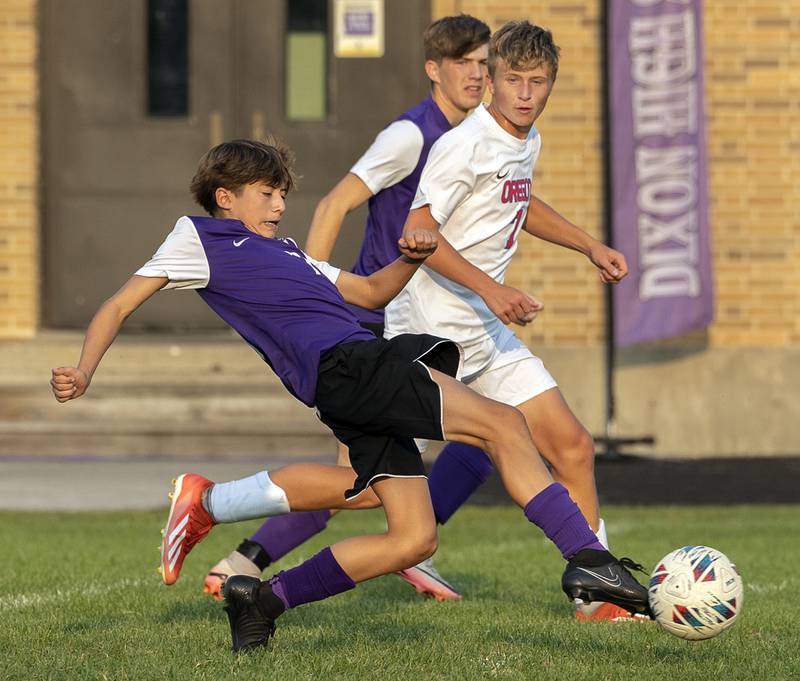 Dixon’s Josh Stees reaches for the ball against Oregon Wednesday, Sept. 11, 2024, at EC Bowers field in Dixon.