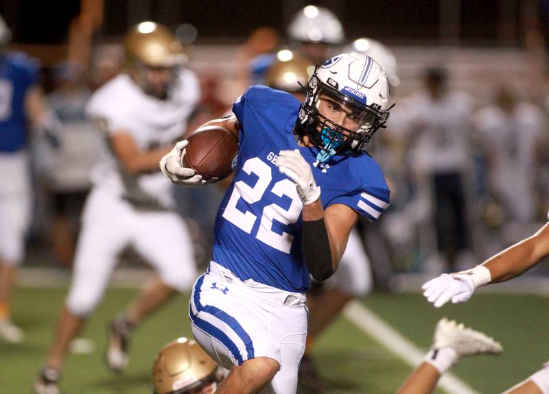 Geneva’s Dominic Deleonardi runs the ball during a game against Lemont Friday, Sept. 6, 2024 at Geneva.