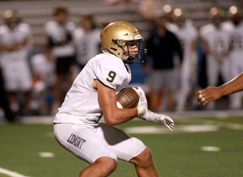 Lemont’s Jackson Dybcio runs the ball during a game Friday, Sept. 6, 2024 at Geneva.