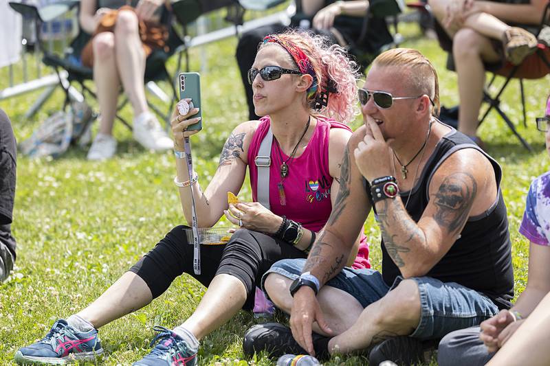 Fans take pictures and video of performers Saturday, June 15, 2024, at Dixon Pride Fest.