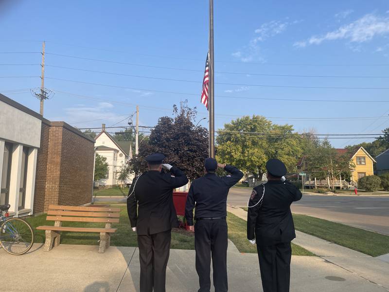 An American flag is seen Sept. 11, 2024, being raised at DeKalb Fire Station No. 1, 700 Pine St., in DeKalb.