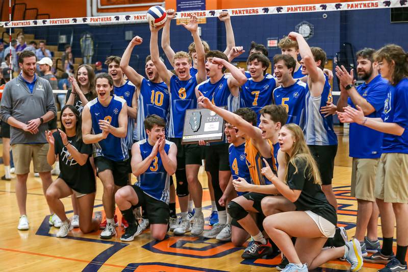 Lyons poses with the Oswego Sectional final plaque after defeating Downers Grove North.  May 30, 2023.