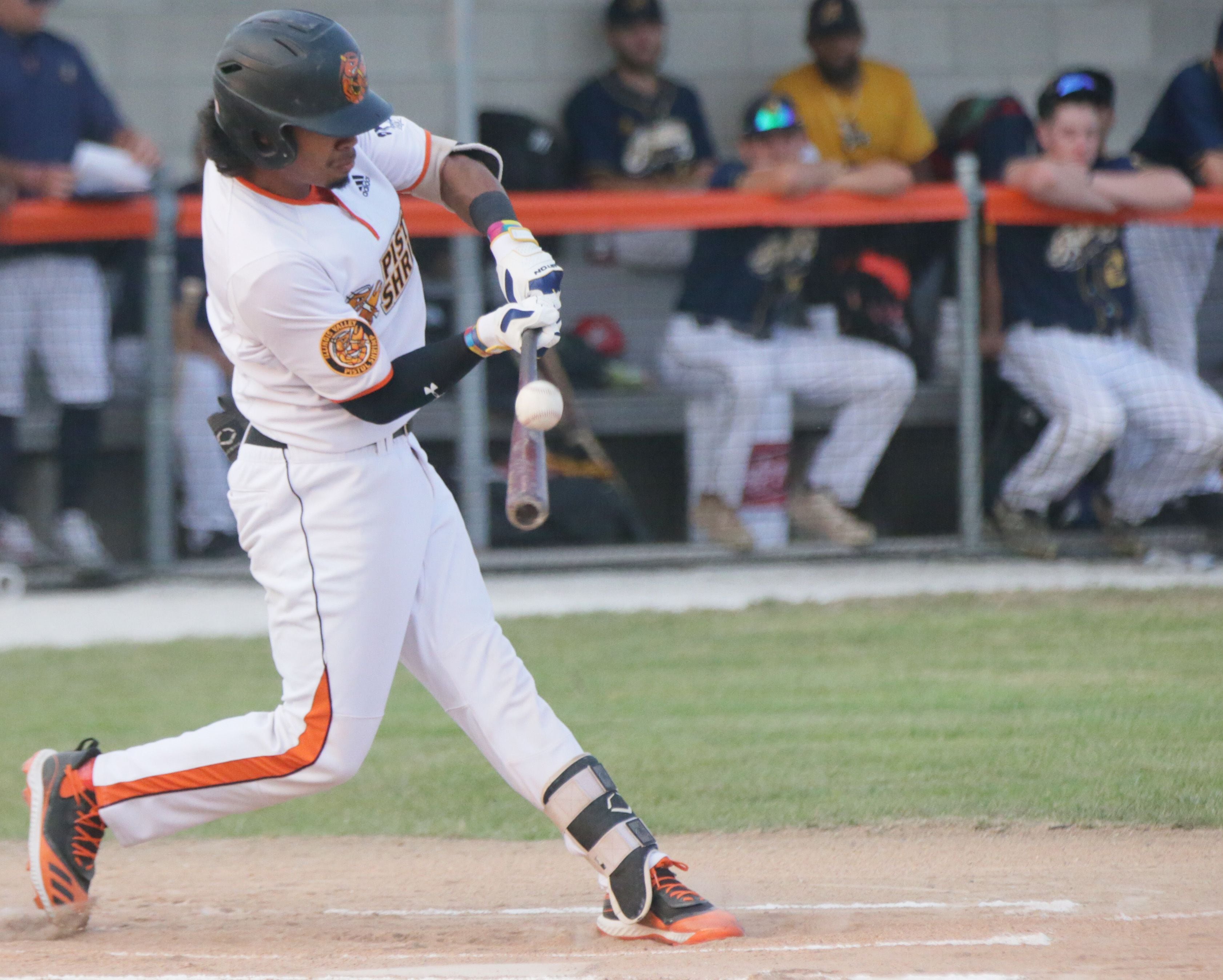 Pistol Shrimp's Keshawn Ogans, hits the ball against Lafayette during the final home game of the 2021 season at Veterans Park in Peru.