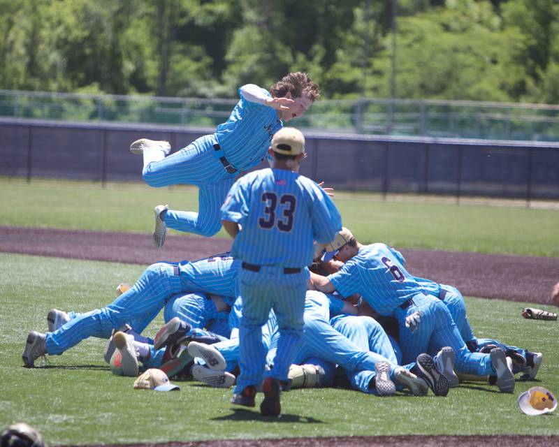 Marquette celebrates the win over Harvest Christian at the Class 1A Sectional Final on Saturday May 25, 2024 in Elgin.