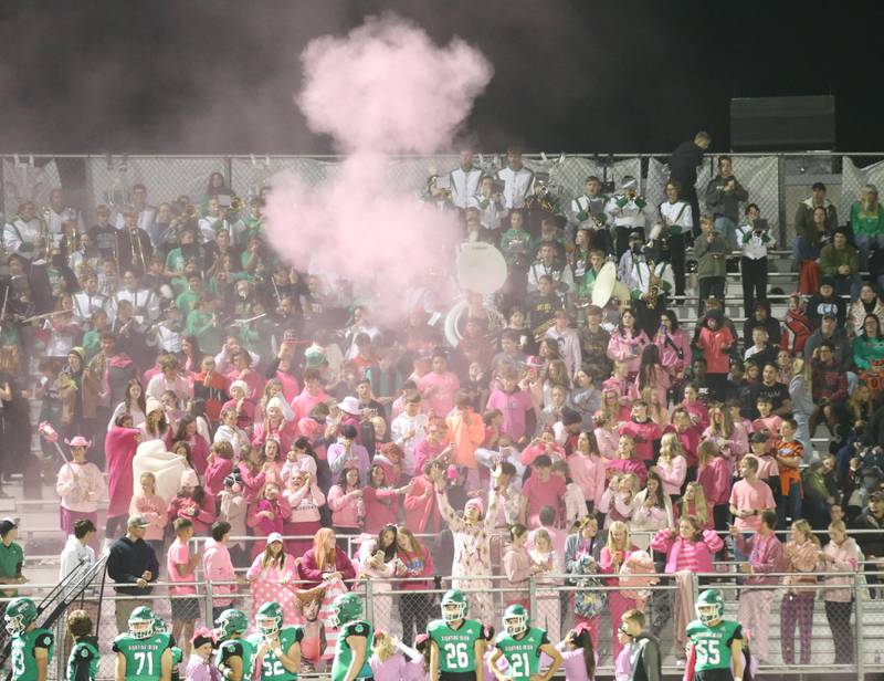 The Seneca student section celebrate when the Irish scored their first touchdown over Marquette on Friday, Oct. 18, 2024 at Seneca High School.