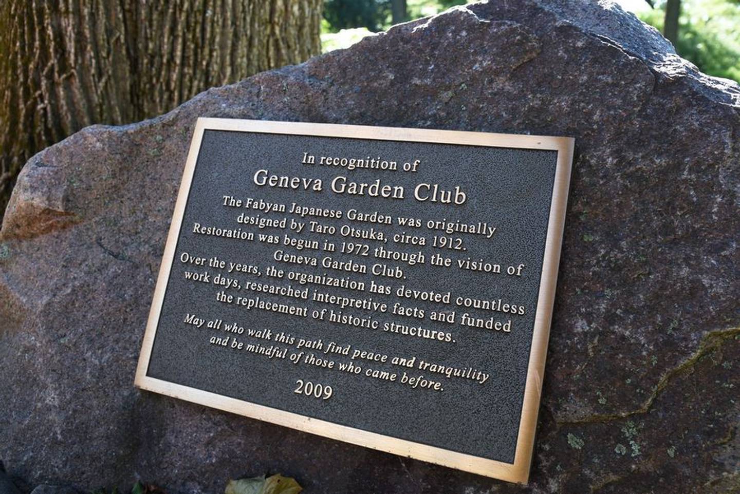 A Geneva Garden Club plaque sits in the Japanese Tea Garden at Fabyan Forest Preserve in Geneva.