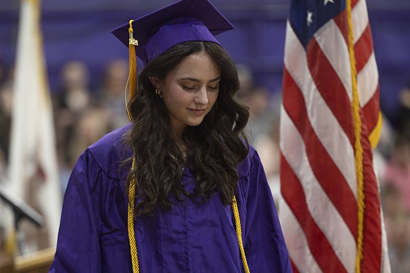 Valedictorian Emily Smith leaves the stage after reading her speech Sunday, May 26, 2024 at Dixon High School’s graduation.