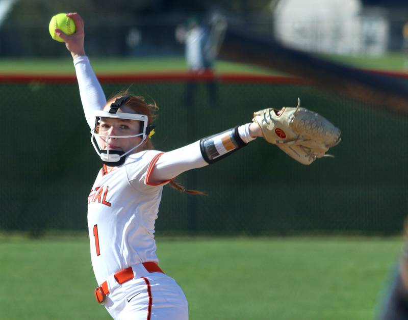 Crystal Lake Central’s Makayla Malone makes an offering against Woodstock North in varsity softball at Crystal Lake Friday.