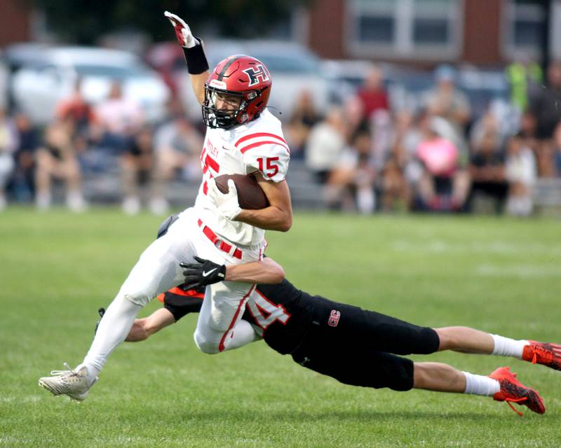 Huntley’s Connor Wade runs the ball in varsity football on Friday, Aug. 30, 2024, at Metcalf Field on the campus of Crystal Lake Central High School in Crystal Lake.