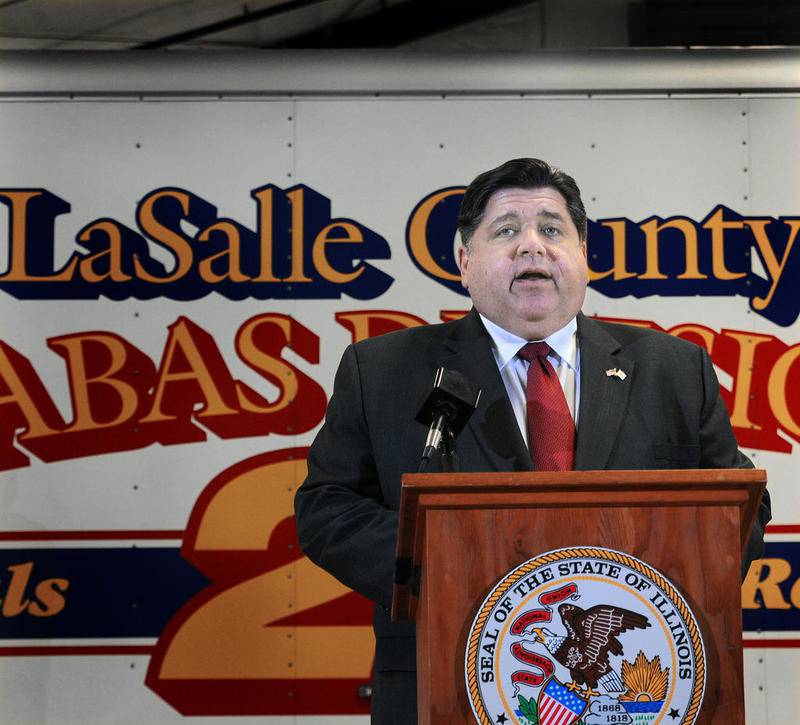 Gov. JB Pritzker addresses the rising rates of COVID-19 in the LaSalle County area at the LaSalle County Emergency Management Agency on July 30.