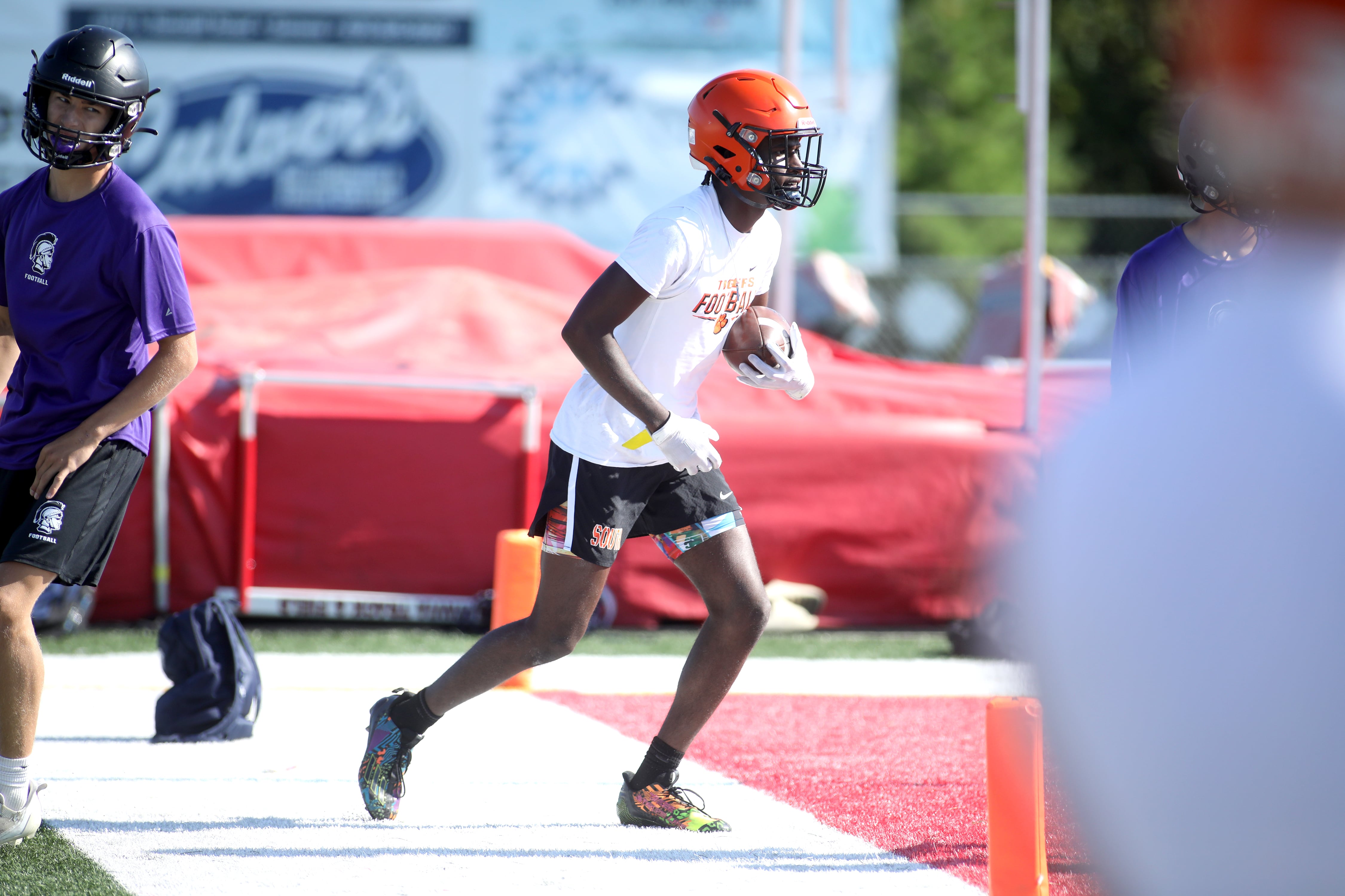 Wheaton Warrenville South’s Amari Williams scores during a 7-on-7 tournament at Batavia High School on Thursday, July 18, 2024.