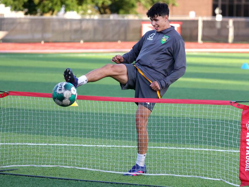 DeKalb County United’s Ilir Redzepi, from DeKalb, plays soccer tennis Thursday, June 6, 2024, at the Northern Illinois University Soccer and Track and Field Complex in DeKalb.