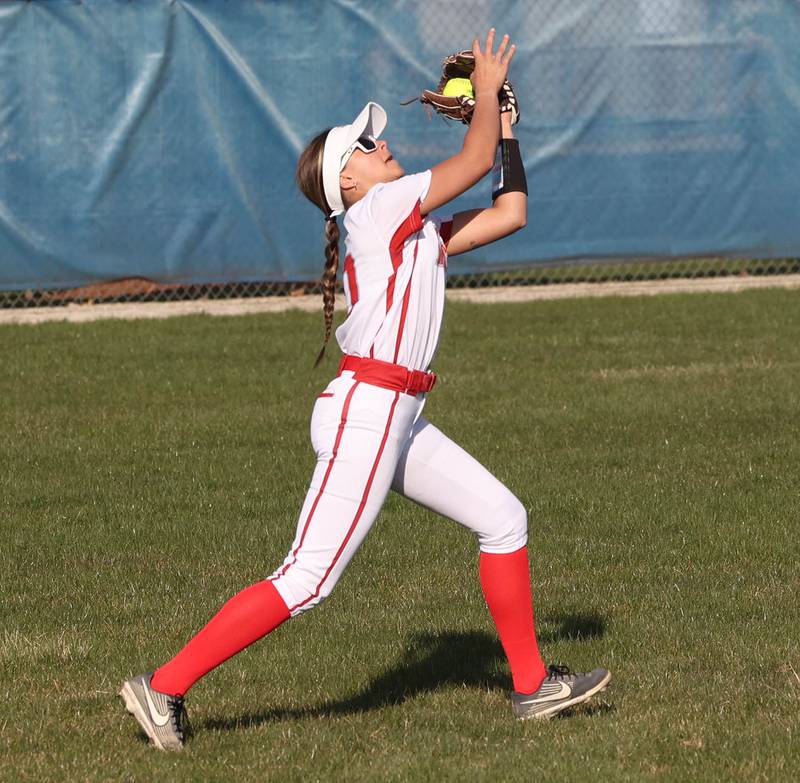 Oregon's Haleigh Burkhart makes a catch in left field during their game against the Cogs Tuesday, April 9, 2024, at Genoa-Kingston High School.