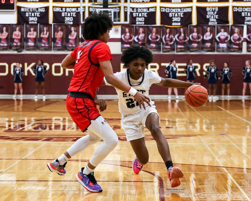 Oswego East's Javion Starwood (22) drives to the basket during Class 4A Lockport Regional final game between West Aurora at Oswego East.  Feb 24, 2023.