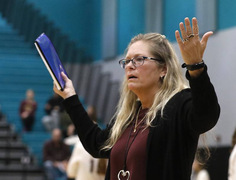 Prairie Ridge coach Stefanie Otto reacts to the change of an out of bounds call in the third game of the Class 3A Woodstock North Sectional finals volleyball match against  Belvidere North on Wednesday, Nov. 1, 2023, at Woodstock North High School.