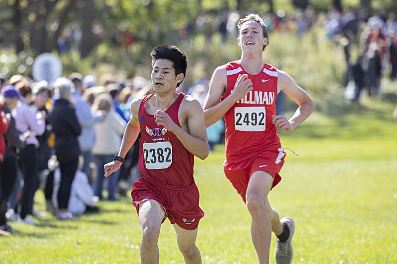 Oregon’s Caleb Brooks (left) sprints for the finish in the 50th Amboy Columbus Day Cross Country Invite Monday, Oct. 9, 2023.