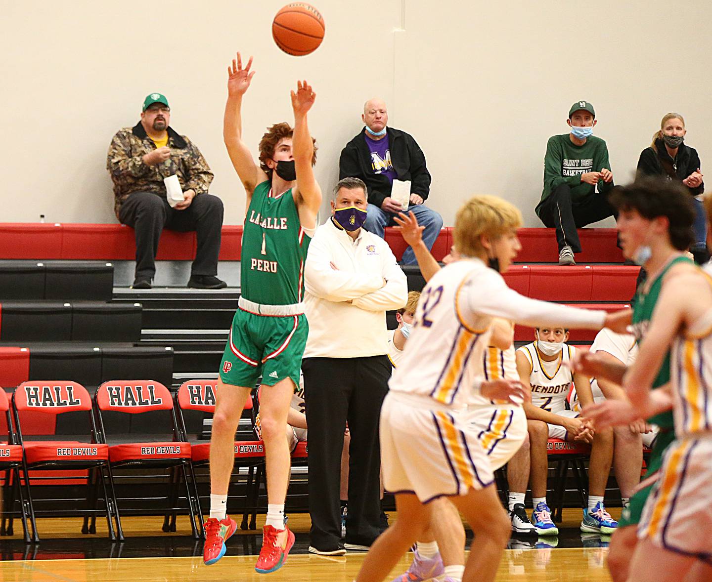 L-P’s John Riva, (1) shoots a wide-open three point basket over Mendota during the 47th Colmone Classic tournament on Tuesday Dec. 7, 2021 at Hall High School in Spring Valley.