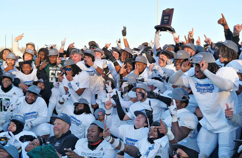 College of Dupage's football team celebrates their win over North Dakota State College of Science after the NJCAA DIII National Championship game on Dec. 3, 2022 at College of Dupage in Glen Ellyn.