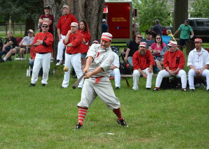 Ganymede Justin "Butter" Early connects on a pitch during the vintage base ball game against the DuPage Plowboys at the John Deere Historic Site in Grand Detour on Saturday, June 8, 2024.