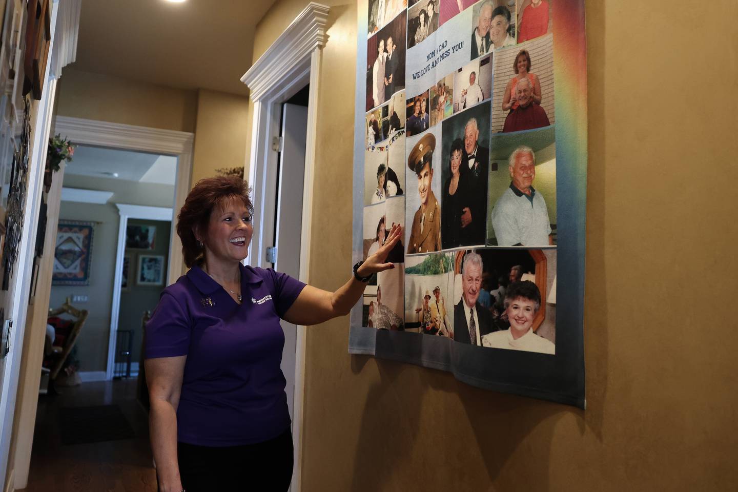 Audrey Montalto shows off her photo quilt of her parents Gene and Millie Majka, both of them passed away due to pancreatic cancer, along with photos of her in-laws on Thursday June 27, 2024 in Plainfield.