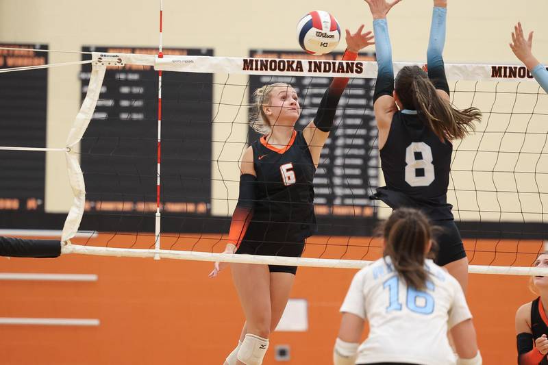 Minooka’s Kendall Kozak hits a shot against Joliet Catholic on Wednesday, Sept. 4, 2024 in Minooka.