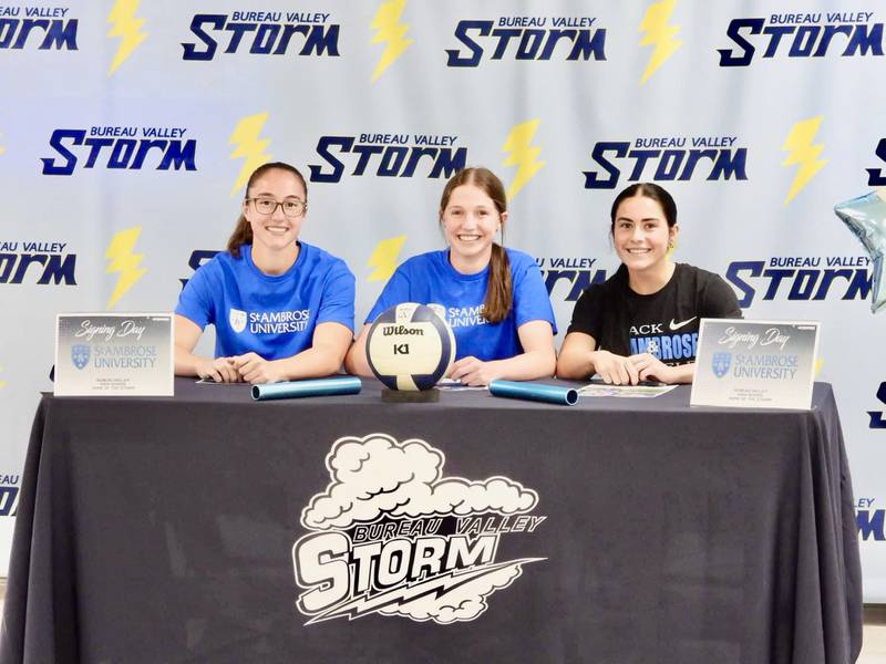 Bureau Valley grads Lynzie Cady (from left), Kate Salisbury and Connie Gibson have made their intentions to compete collegiately for St. Ambrose University. Cady and Gibson will run for the Bees' track & field team while Salisbury will play for volleyball team.