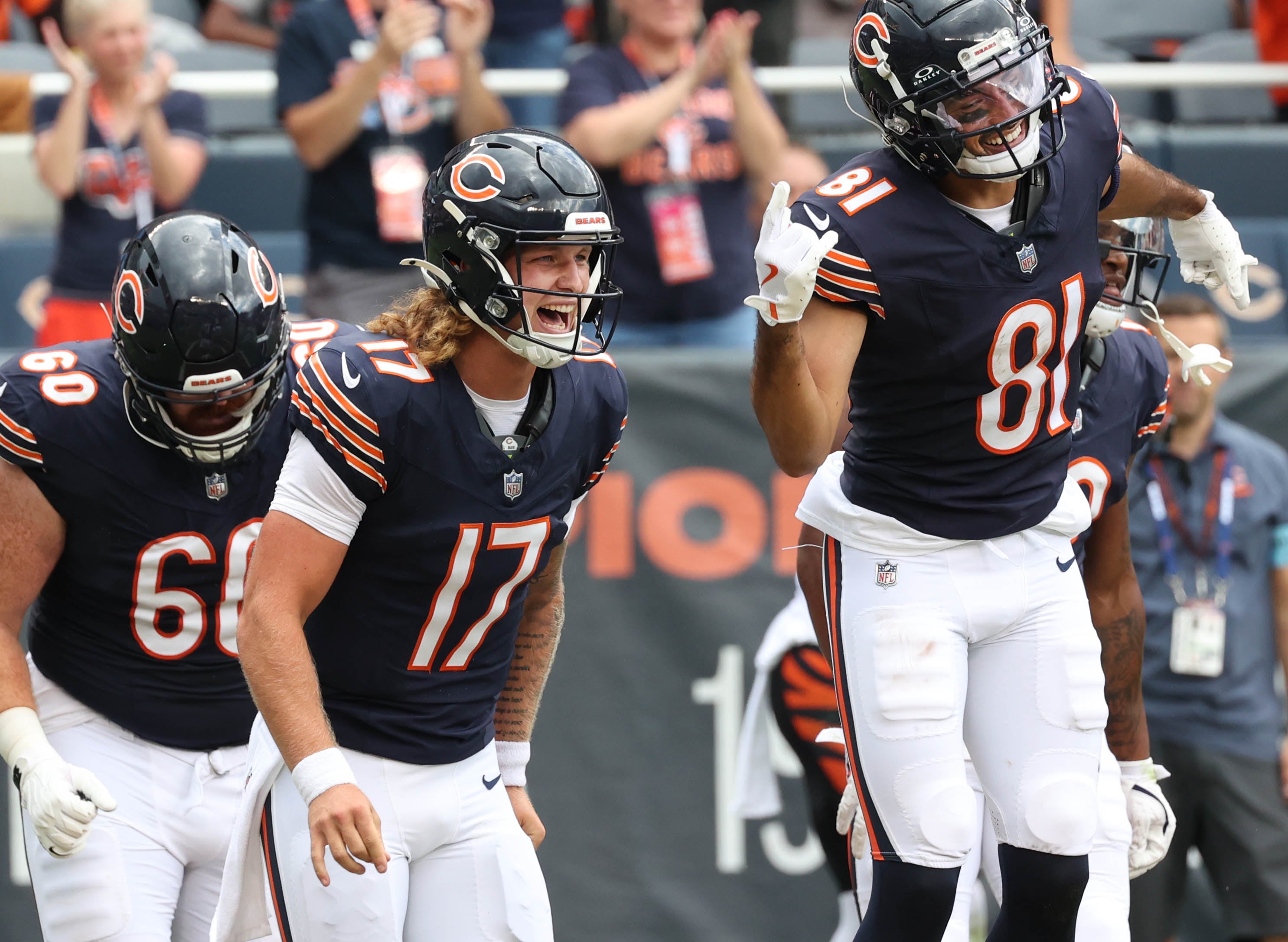 Chicago Bears quarterback Tyson Bagent (left) and wide receiver Dante Pettis celebrate their touchdown connection during their game against the Cincinnati Bengals Saturday, Aug. 17, 2024, at Soldier Field in Chicago.