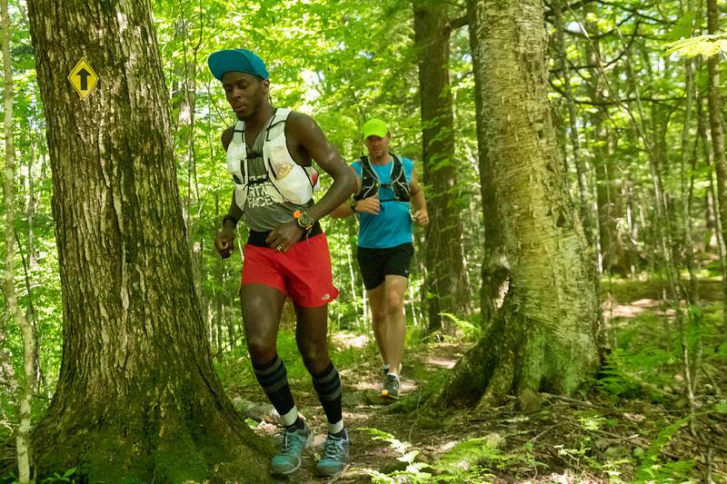 Coree Woltering (front) runs on the Ice Age Trail in Wisconsin. Woltering set a new Ice Age Trail record by completing the nearly 1,200 miles in 21 days. In the process, he raised nearly $28,000 for Feed America and hopes to raise $50,000.