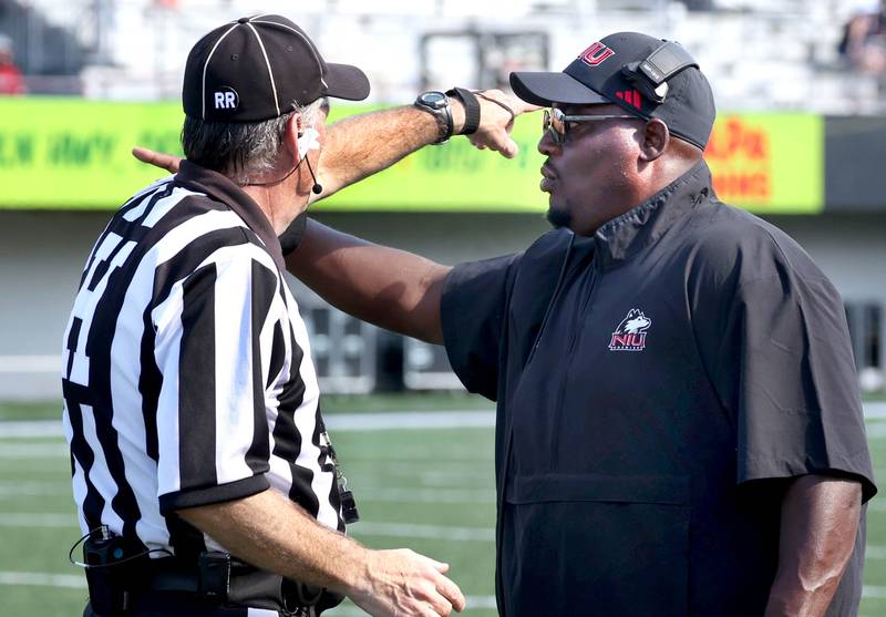 Northern Illinois head coach Thomas Hammock talks to an official during their game against Western Illinois Saturday, Aug. 31, 2024, in Huskie Stadium at NIU in DeKalb.