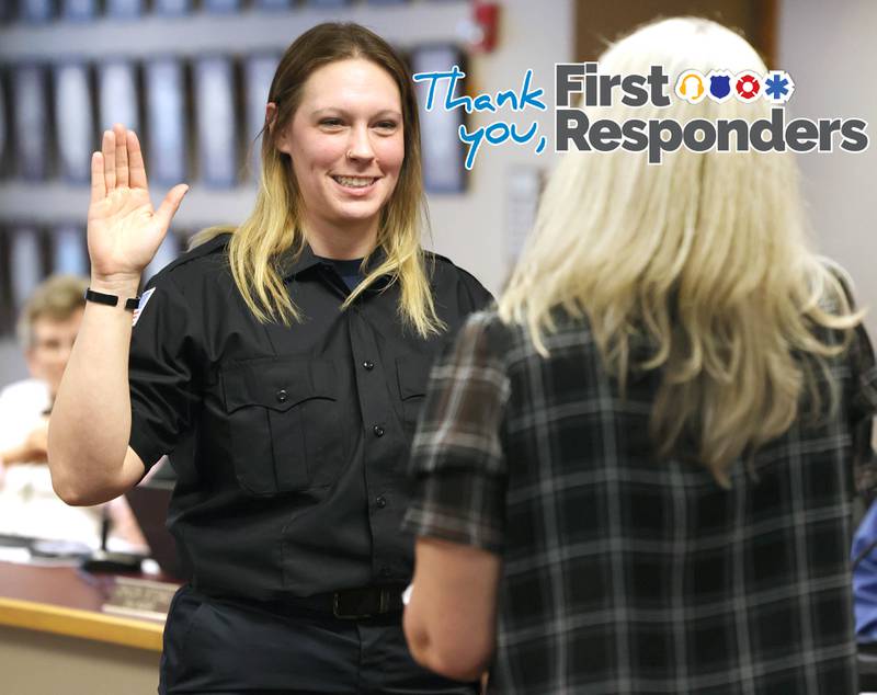 New Sycamore firefighter KeeLey Meyer is officially sworn in by city clerk Mary Kalk Monday, April 1, 2024, during the Sycamore City Council meeting in the chambers at Sycamore Center.