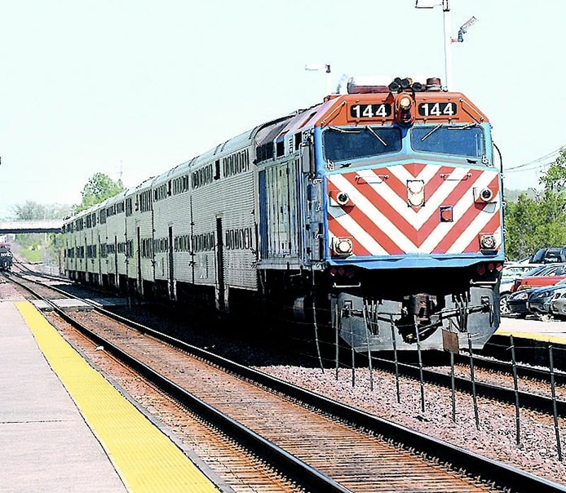 A Metra train rides along the BNSF line.