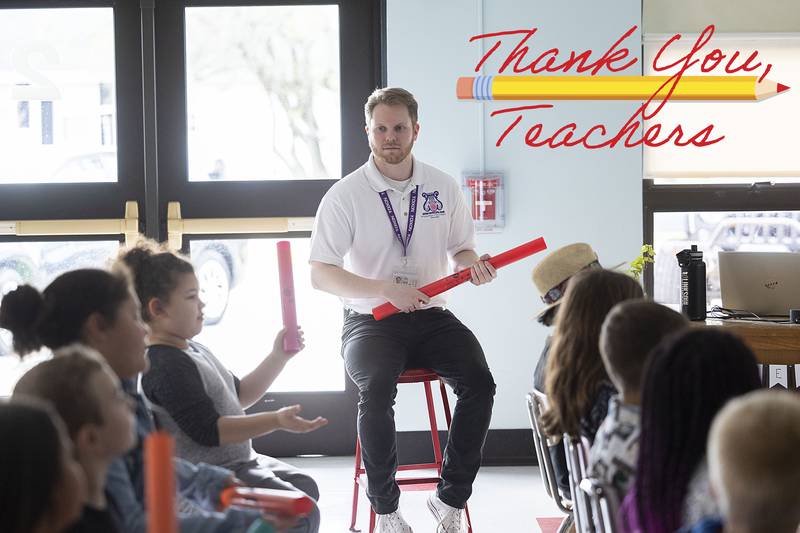 Jefferson School music teacher Nolan Lewis leads his class Friday, April 21, 2023. Lewis requested money from the Dixon Schools Foundation go to purchase the plastic instruments. Last year the foundation purchased ukeleles for the music program.