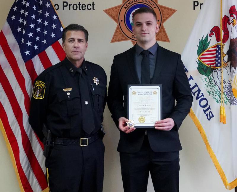 Kendall County Chief Deputy Michael Peters, left, with new deputy Trent Stafford.